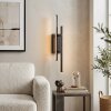 Kiron längliche LED Wandleuchte mit weißem Lichtstreifen für Wohnzimmer