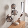 Wandleuchte Koyoto mit drei runden Rauchglasschirmen und Lichteffekt an der Wand